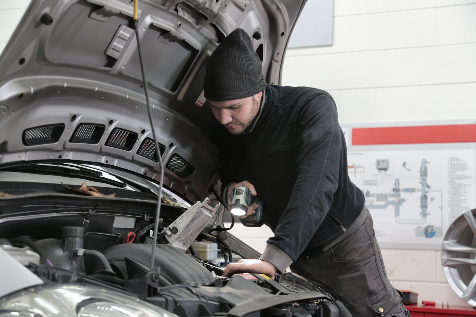 Mechanic working in a tire service bay